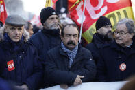 CGT union leader Philippe Martinez, center, attends a demonstration Thursday, Jan. 16, 2020 in Paris. Protesters denounce French President Emmanuel Macron's plans to overhaul the pension system. (AP Photo/Kamil Zihnioglu)