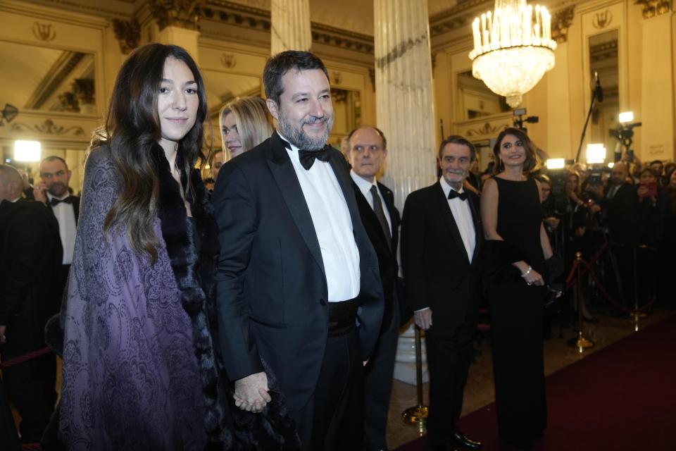 Italian Infrastructures Minister Matteo Salvini and his partner Francesca Verdini arrive to attend La Scala opera house's gala season opener, Giuseppe Verdi's opera 'Don Carlo' at the Milan La Scala theater, Italy, Thursday Dec. 7, 2023. The season-opener Thursday, held each year on the Milan feast day St. Ambrose, is considered one of the highlights of the European cultural calendar. (AP Photo/Luca Bruno)