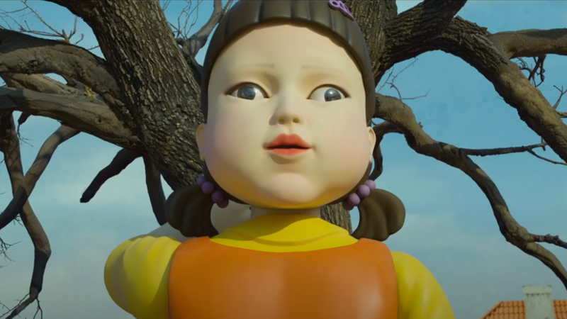 A scene from Netflix's Squid Game with a girl's head turned 180 and looking crosseyed.