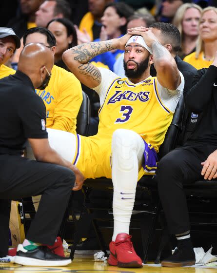 San Francisco, California May 10, 2023-Lakers Anthony Davis gets hit in the head against the Warriors.