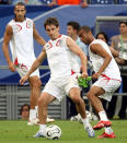 Gary Neville (centre) says Ashley Cole (right) is “seeking asylum in MLS” to get away from abuse (Martin Rickett/PA)