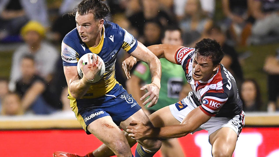 Clint Gutherson, pictured here in action for the Eels against the Roosters. 