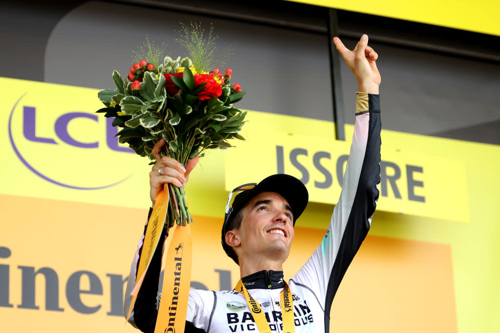  ISSOIRE FRANCE  JULY 11 Pello Bilbao of Spain and Team Bahrain Victorious celebrates at podium as stage winner and dedicates the victory to his teammate Gino Mder of Switzerland during the stage ten of the 110th Tour de France 2023 a 1672km stage from Vulcania to Issoire  UCIWT  on July 11 2023 in Issoire France Photo by Michael SteeleGetty Images 