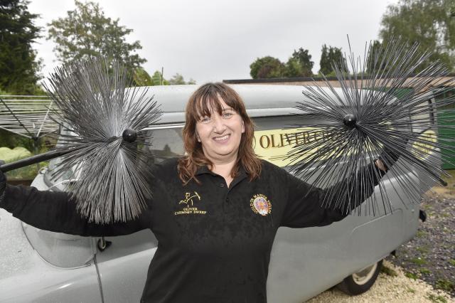 Susan Oliver (48) from Denmead, owns a 1959 Bedford CA van called Nancy which she operates her business Oliver Chimney Sweep from. Picture: Sarah Standing (140723-6687)