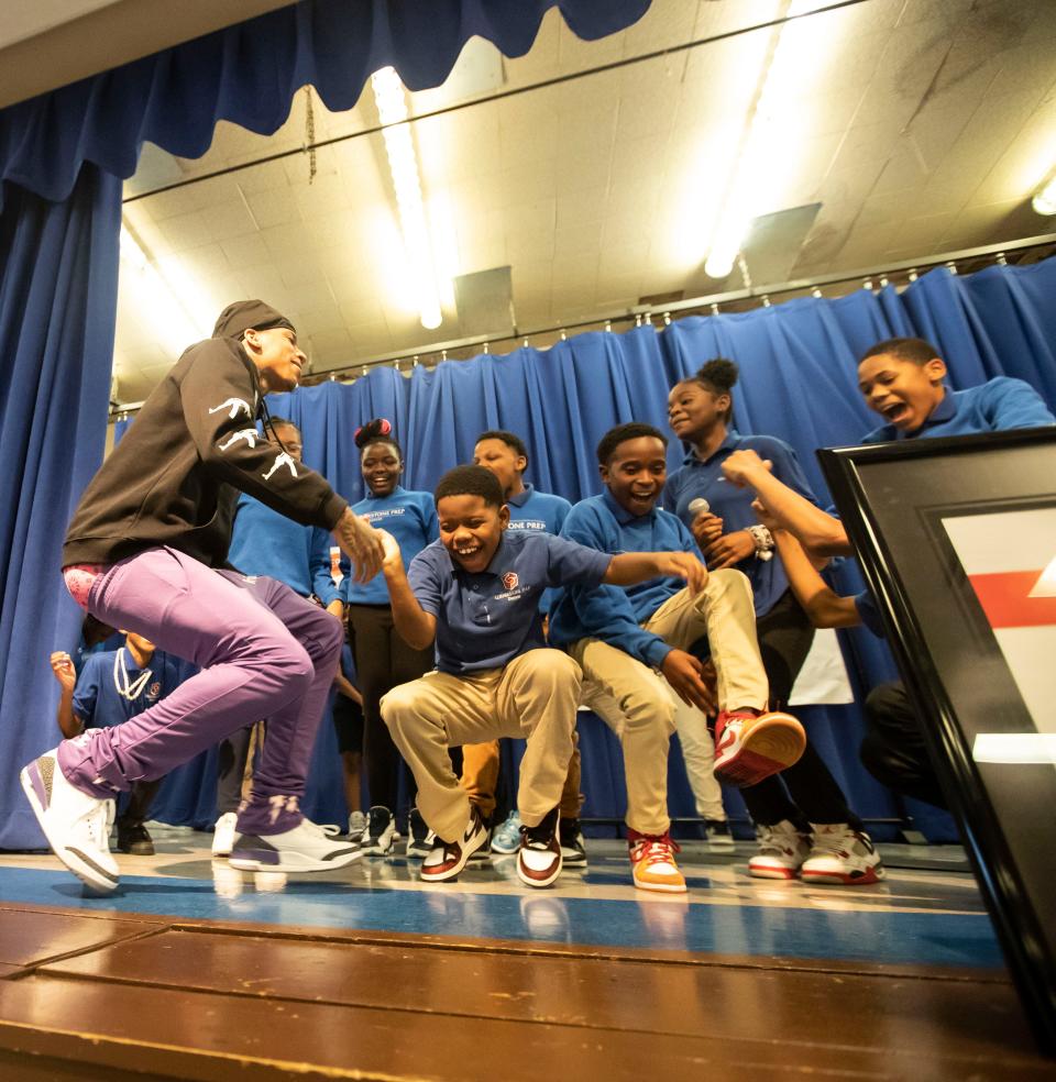 NLE Choppa dances with students at Cornerstone Prep Denver on Tuesday, Oct. 18, 2022, in Memphis.