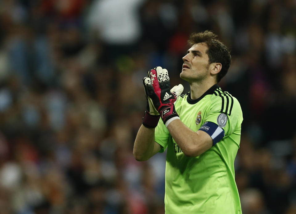 Real goalkeeper Iker Casillas reacts during a first leg semifinal Champions League soccer match between Real Madrid and Bayern Munich at the Santiago Bernabeu stadium in Madrid, Spain, Wednesday, April 23, 2014. (AP Photo/Andres Kudacki)