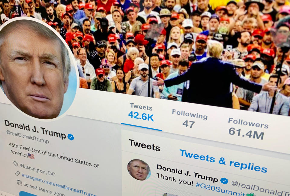 FILE - In this June 27, 2019, file photo, The U.S. President Donald Trump's Twitter feed is shown on a computer, in New York. Reports of hateful and violent speech on Facebook poured in on the night of May 28 after President Donald Trump hit send on a social media post warning that looters who joined protests following Floyd's death last year would be shot, according to internal Facebook documents shared with The Associated Press. (AP Photo/Jenny Kane, File)