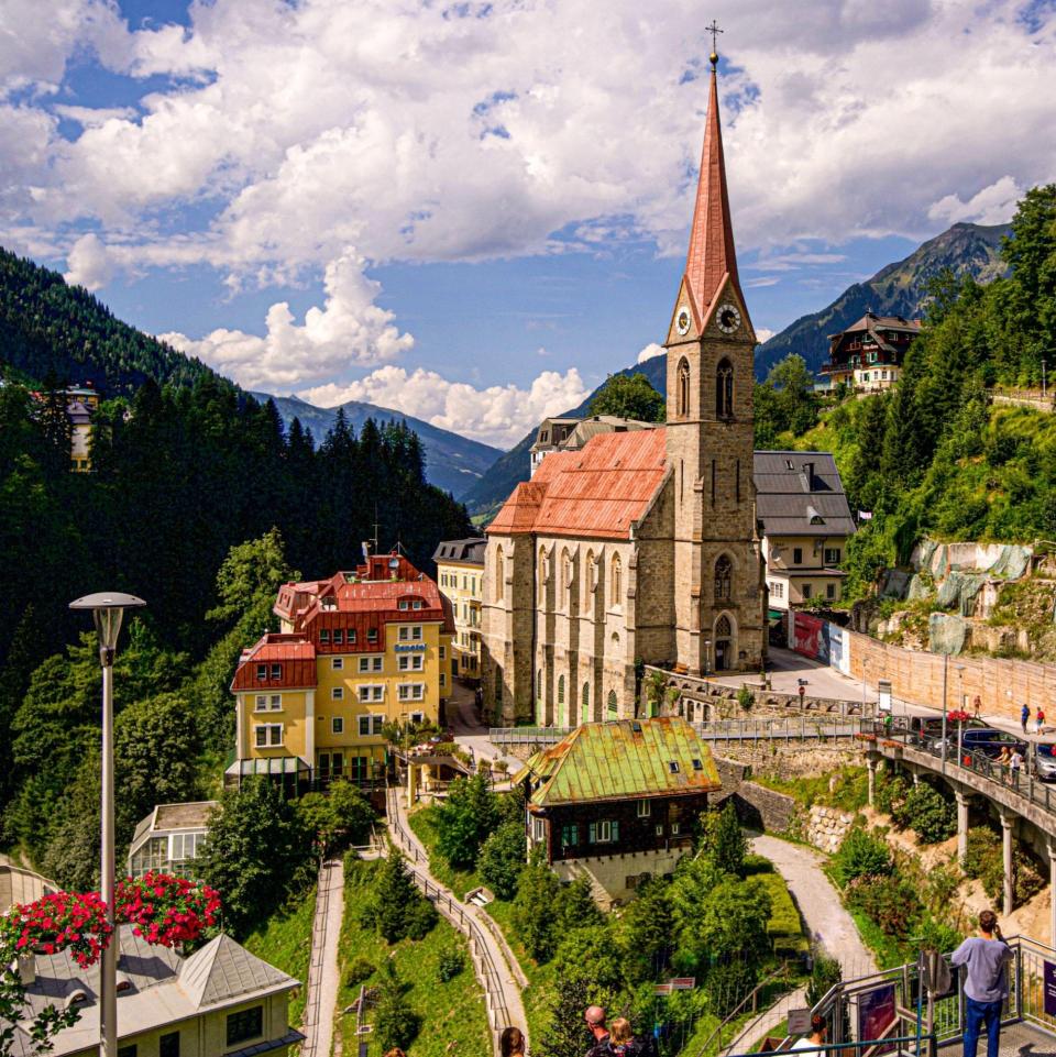 The thermal spring park and parish church in Bad Gastein