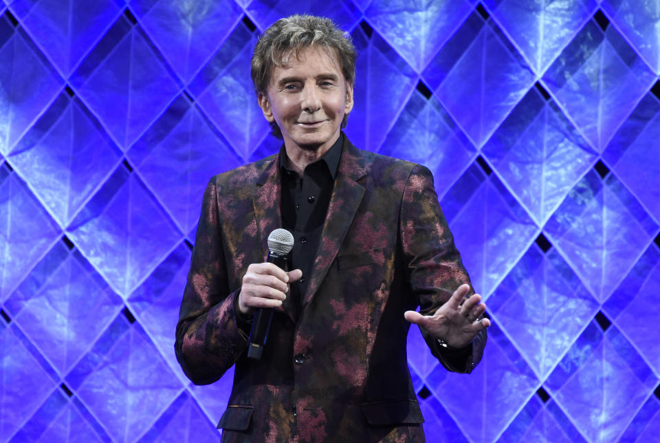 FILE - Barry Manilow speaks at the 65th annual BMI Pop Awards on May 9, 2017, in Beverly Hills, Calif. Manilow turns 74 on June 17. (Photo by Chris Pizzello/Invision/AP, File)