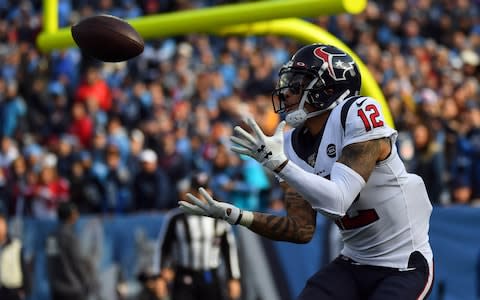 Houston Texans wide receiver Kenny Stills (12) catches his second touchdown pass of the first half against the Tennessee Titans at Nissan Stadium - Credit: USA Today