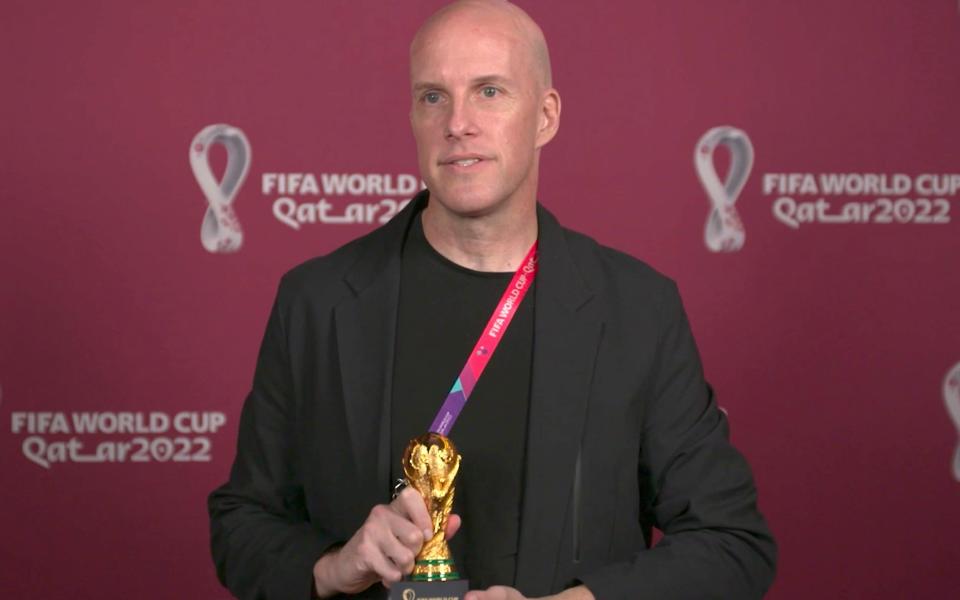 Journalist Grant Wahl at an awards ceremony in Doha - AP