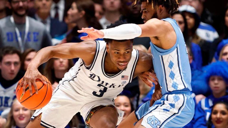 Duke’s Jeremy Roach (3) works against North Carolina’s R.J. Davis (4) during the first half of Duke’s game against UNC at Cameron Indoor Stadium in Durham, N.C., Saturday, Feb. 4, 2023.