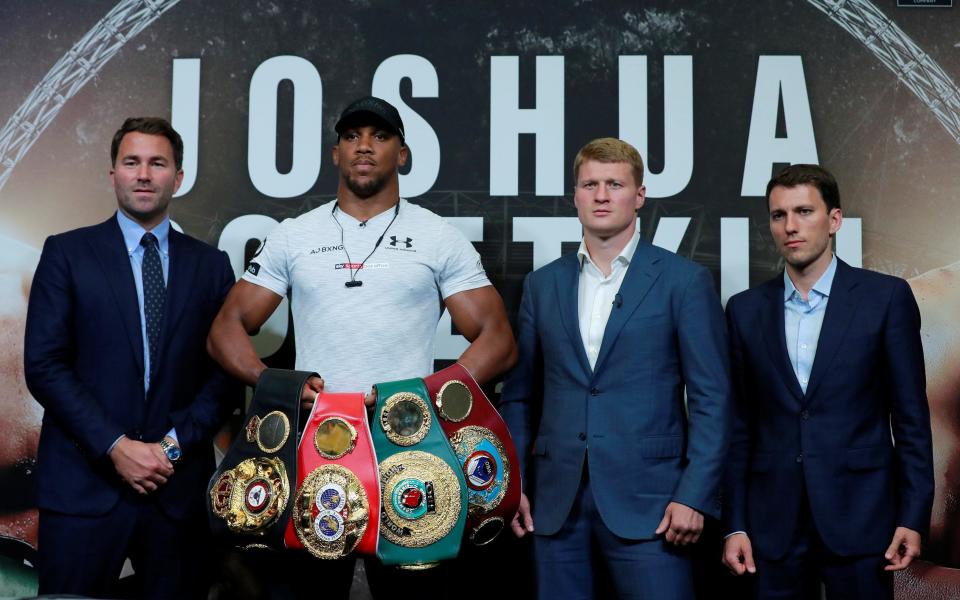 Anthony Joshua is defending all four of his world title belts against Alexander Povetkin on Saturday  - Getty Images 