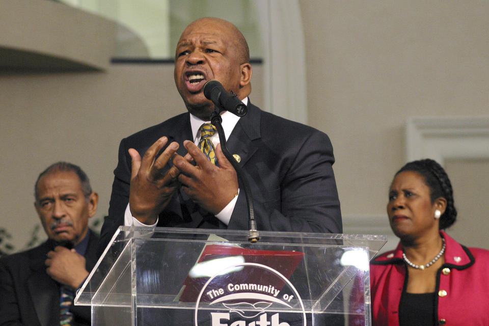 FILE - In this Sunday, March 30, 2003 file photo, Congressional Black Caucus Chairman Rep. Elijah Cummings, D-Md., speaks about affirmative action, accompanied by Rep. John Conyers, D-Mich., left, and Rep. Sheila Jackson Lee, D-Texas, right, during a church service at Community of Faith Church in Houston. “Although Congressman Cummings was not a preacher in the sense of being ordained and licensed, him being a preacher’s kid made him pretty close and made him very comfortable with ministers and clergy _ to a point where in many respects many of us in the clergy community, in the African-American community, almost regarded him as a preacher,” said the Rev. Charles Williams II, senior pastor of Detroit’s Historic King Solomon Missionary Baptist Church. (AP Photo/Michael Stravato)