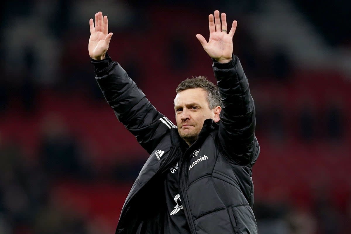 Michael Skubala acknowledges Leeds’ fans after his first game as caretaker boss ended in a 2-2 draw at Manchester United (Martin Rickett/PA) (PA Wire)