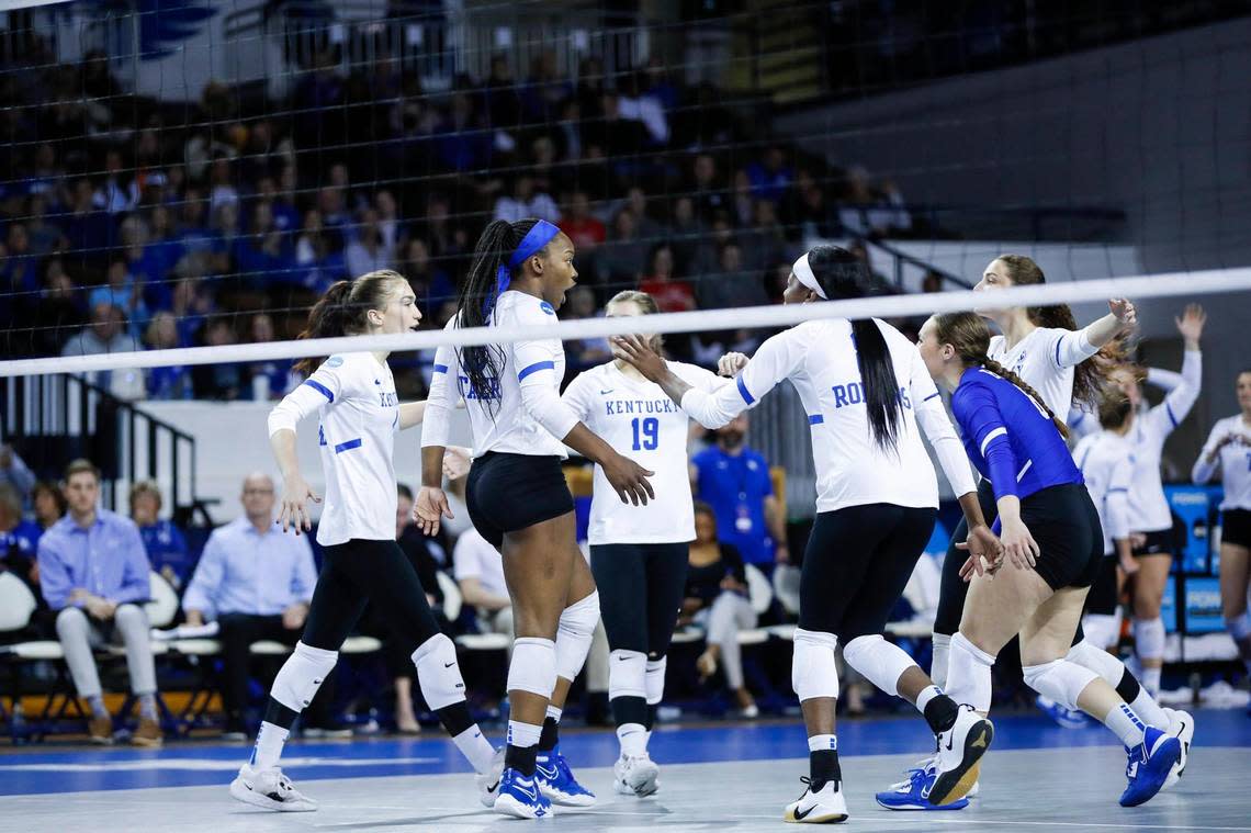 Kentucky players celebrate a point during their NCAA Tournament opening-round win over Loyola (Chicago) on Thursday night in Memorial Coliseum.