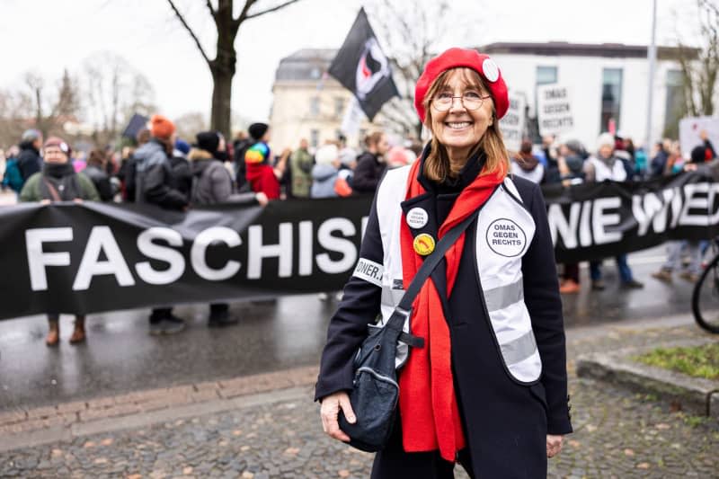 Uta Saenger, a member of Germany's Grandmas Against The Right group, at a demonstration in Hanover. Germany has been swept by a wave of protests against far-right extremism in recent weeks. Grandmas Against the Right - present at every rally - has been campaigning against far-right parties, anti-Semitism and racism for years. Michael Matthey/dpa