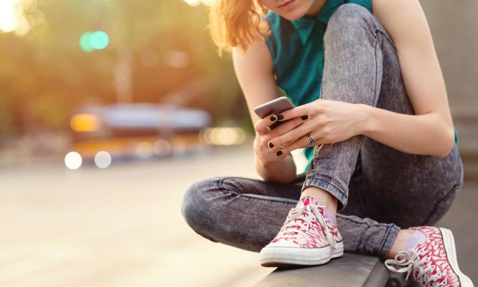 <span>A recent report found extended screen time has become increasingly normal for teenagers.</span><span>Photograph: Mixmike/Getty Images</span>