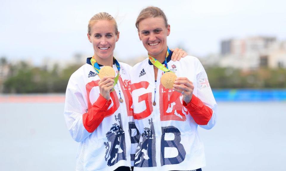 Heather Stanning (right) with Helen Glover as they show off their gold medals at the 2016 Olympics in Rio.