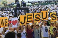 Worshippers wait for Pope Benedict XVI to attend an open-air mass in Beirut on the final day of his visit to Lebanon. The pope prayed on Sunday that Middle East leaders work towards peace and reconciliation, stressing again the central theme of his visit to Lebanon, whose neighbour Syria is engulfed in civil war