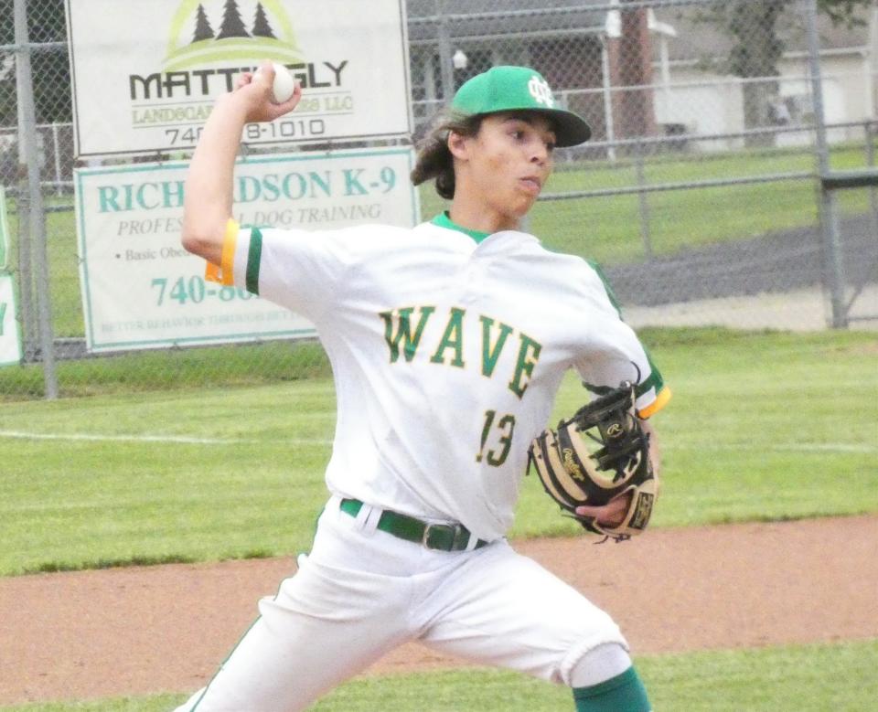 Newark Catholic junior Braylon Bates pitches against Granville Christian during a Division IV district semifinal on Monday, May 23, 2022. The Green Wave beat the visiting Lions 14-1.