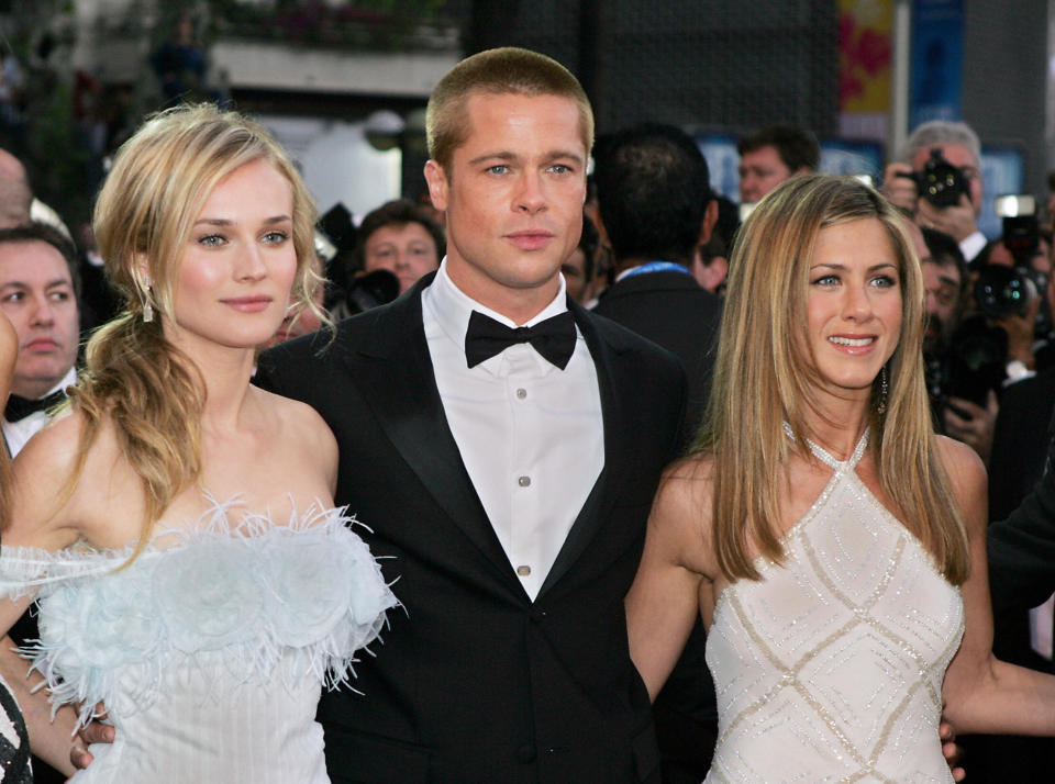 CANNES, France:  US actor Brad Pitt and his wife Jennifer Aniston (R) arrive with German actress Diane Kruger to attend the official projection of US director Wolfgang Petersen's film 