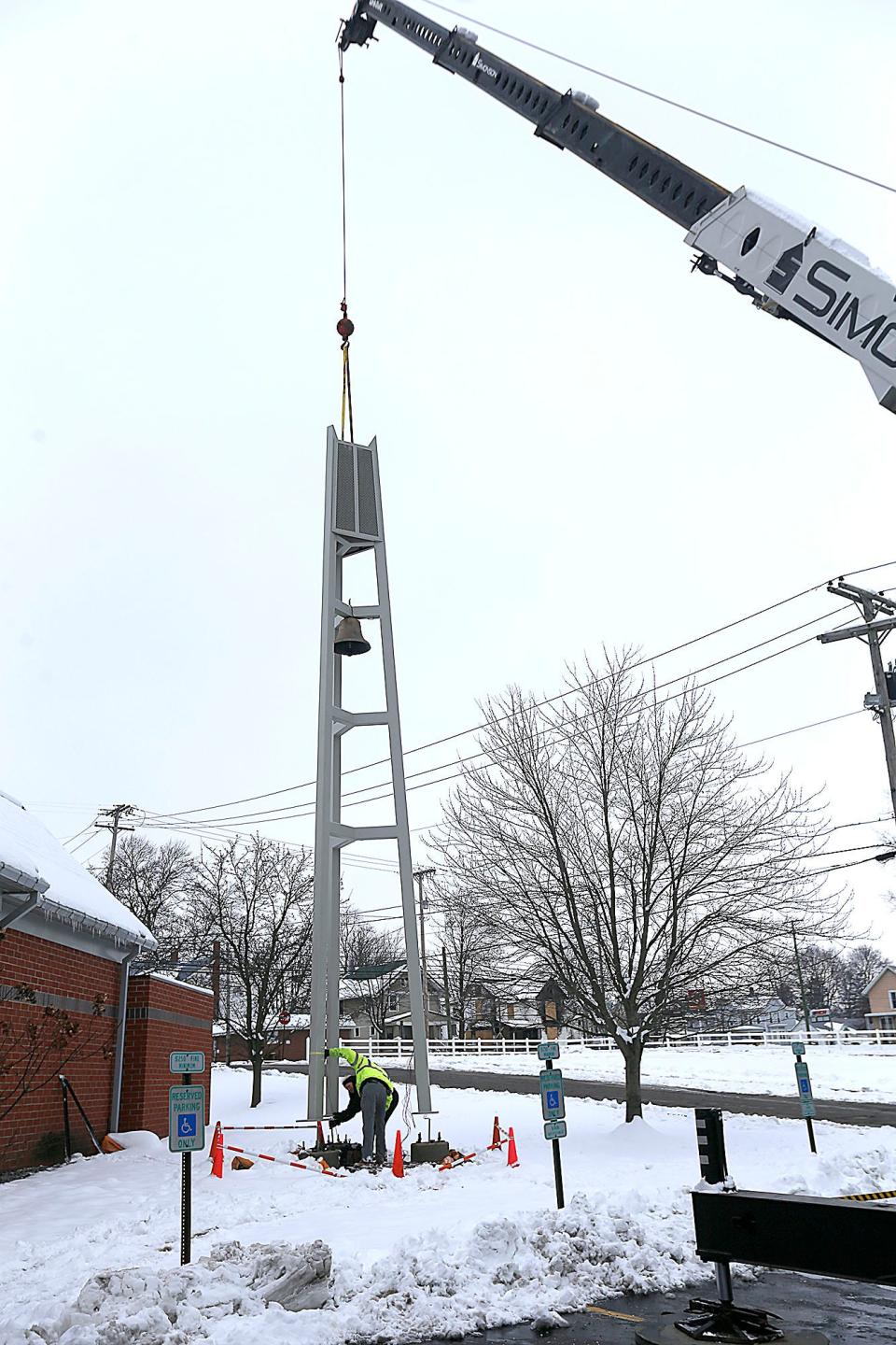 The bell at St. Edward Catholic Church in Ashland was installed on Tuesday.