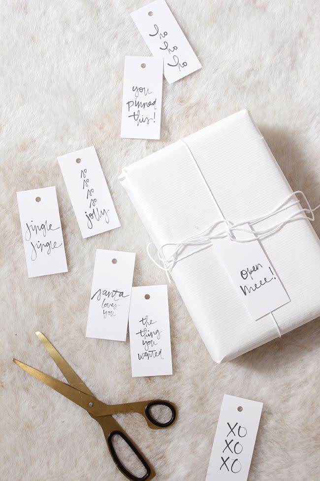 <p>With these printable tags, you’ll be able to share some thoughtful or funny words on your gifts. White twine emphasizes the minimalist vibe.<br></p><p><strong>Get the tutorial at <a href="http://almostmakesperfect.com/2017/11/06/printable-holiday-gift-tags-3/" rel="nofollow noopener" target="_blank" data-ylk="slk:Almost Makes Perfect;elm:context_link;itc:0;sec:content-canvas" class="link ">Almost Makes Perfect</a>. </strong> </p>