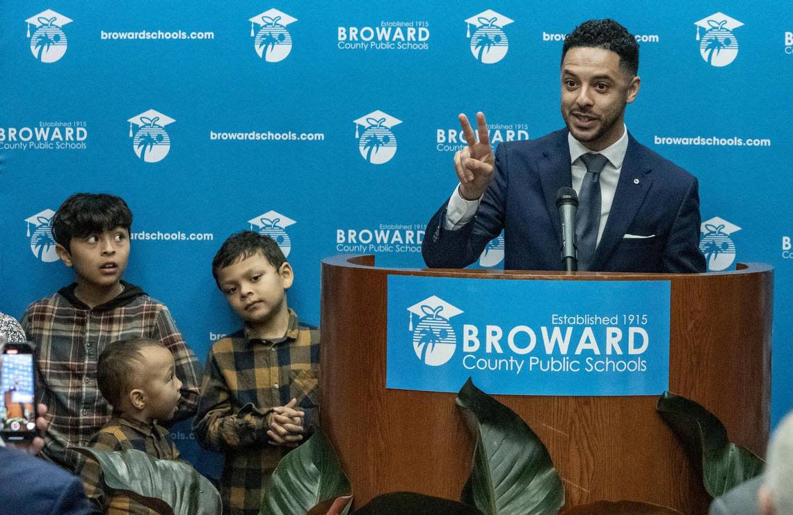 Daniel P. Foganholi, right, speaks after being sworn in on Jan. 18, 2023, as some of his nephews who joined him at the podium listen.