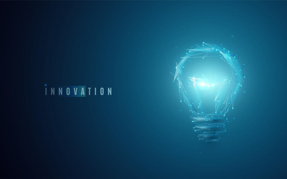 The word innovation positioned next to a light bulb