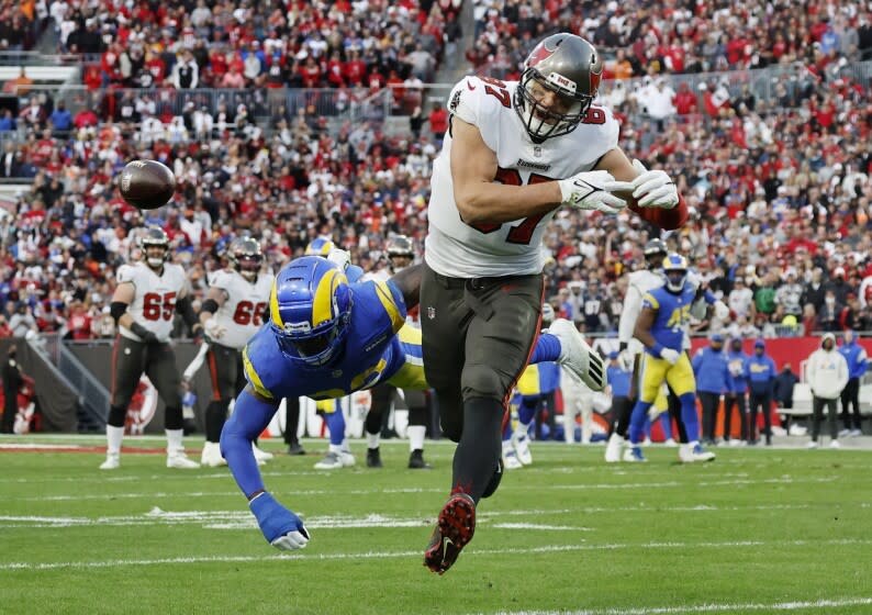 TAMPA BAY, FL- JANUARY 23, 2022: Los Angeles Rams safety Nick Scott (33) breaks up a pass intended for Tampa Bay Buccaneers tight end Rob Gronkowski (87) in the NFC Divisional game at Raymond James Stadium on January 23, 2022 in Tampa Bay, Florida.(Gina Ferazzi / Los Angeles Times)