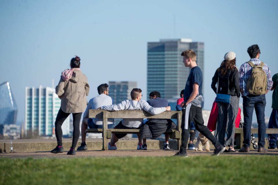 LONDON, ENGLAND - APRIL 05: Members of the public enjoy the day's warm weather on Primrose Hill on April 5, 2020 in London, England. The British government announced strict lockdown measures urging people to stay at home and leave only for basic food shopping, exercise once a day and essential travel to and from work. The COVID-19 pandemic has spread to most countries around the world, claiming nearly 70,000 lives and infecting nearly 1.3 million people. (Photo by Ollie Millington/Getty Images)