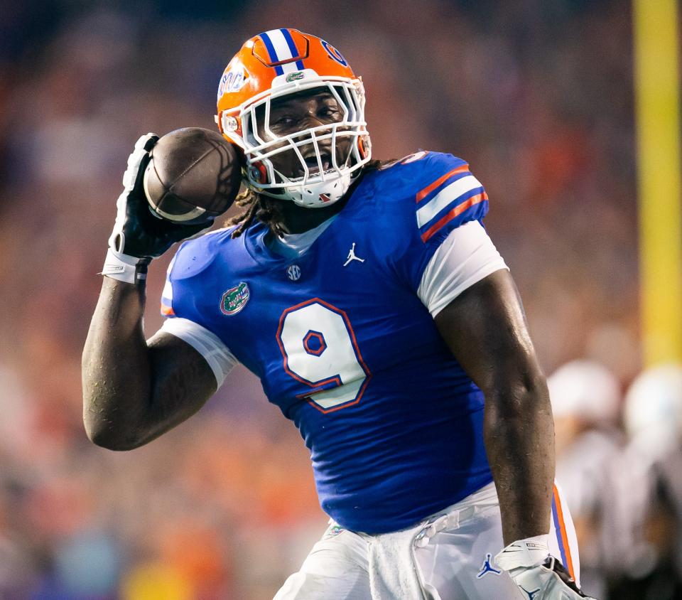Florida Gators defensive lineman Gervon Dexter Sr. (9) celebrates his interception that lead to a touchdown in the first half at Steve Spurrier Field at Ben Hill Griffin Stadium in Gainesville, FL on Saturday, September 10, 2022. Dexter played at Lake Wales High School.