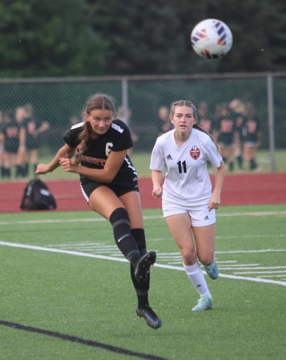 Brighton's Irene Kiilunen boots the ball during a regional semifinal soccer game against Grand Blanc Tuesday, June 6, 2023 in Northville.