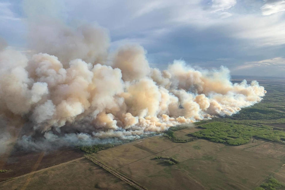 An aerial of rising smoke (Alberta Wildfire Service/AFP - Getty Images)