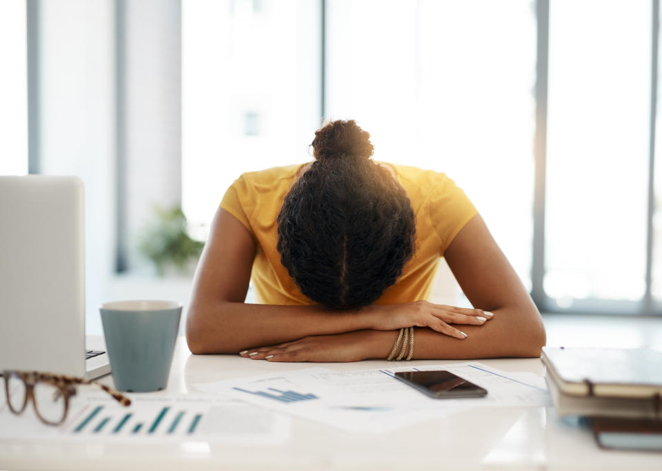 woman working from home with burnout