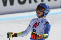 United States' Mikaela Shiffrin reacts at the finish area of an alpine ski, women's World Championships super G, in Meribel, France, Wednesday, Feb. 8, 2023. (AP Photo/Marco Trovati)