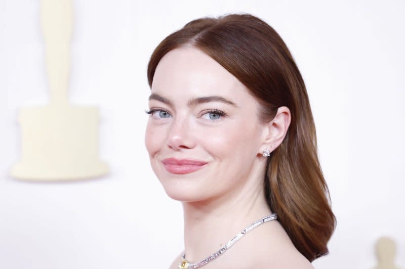 Emma Stone arrives on the red carpet at the Academy Awards in Los Angeles on Sunday. Photo by John Angelillo/UPI