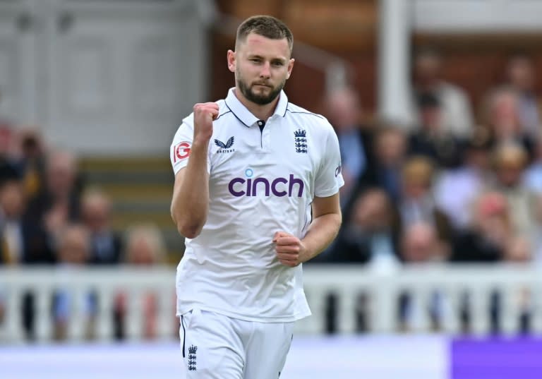 On his way: England's Gus Atkinson celebrates after dismissing West Indies captain Kraigg Brathwaite, his maiden wicket in a debut haul of 7-45 in the first Test at Lord's (Paul ELLIS)