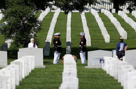 U.S. Marines stand during an interment ceremony at Arlington National Cemetery in Washington, U.S., August 21, 2017. REUTERS/Joshua Roberts