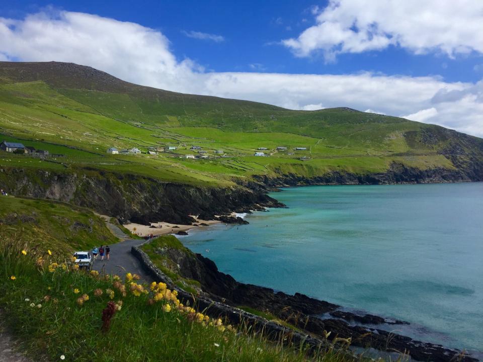 a scenic landscape by the sea in ireland