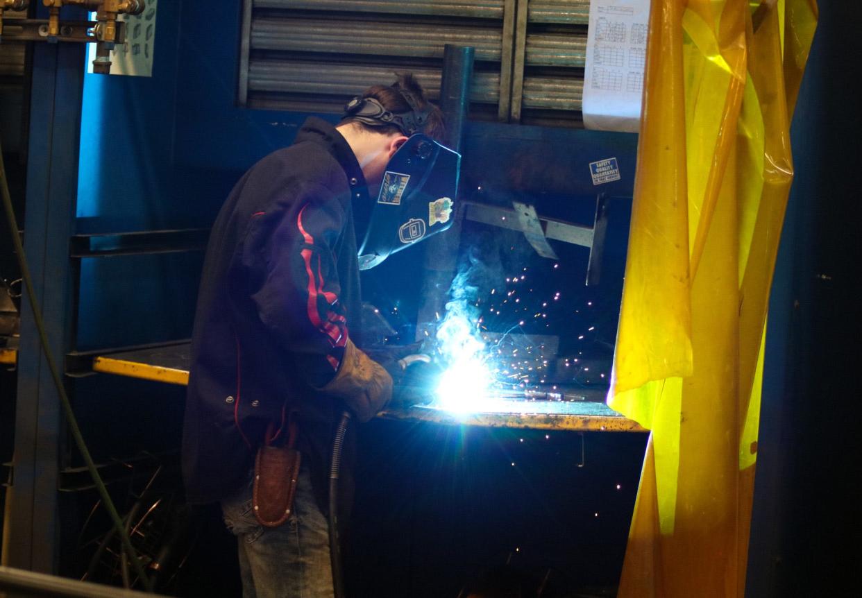 Salina Central senior Dalton Sawyer welds at his station Nov. 8.