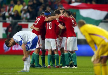 Hungary's players celebtate their victory against Faroe Islands in their Euro 2016 qualifying soccer match in Budapest, Hungary October 8, 2015. REUTERS/Laszlo Balogh