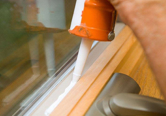 According to the U.S. Department of Energy, applying caulk to a window frame prevents air leakage and saves homeowners energy and money.