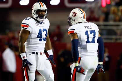 Anthony Swain #43 of the Auburn Tigers celebrates sacking Blake Sims #6 of the Alabama Crimson Tide in the second quarter during the Iron Bowl at Bryant-Denny Stadium on November 29, 2014 in Tuscaloosa, Alabama.  (Photo by Kevin C. Cox/Getty Images)