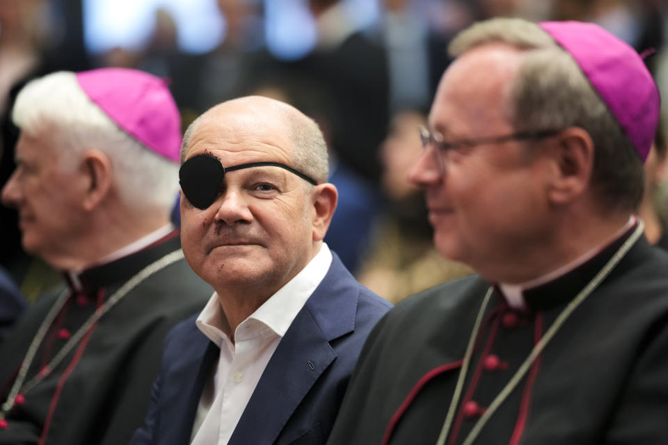 German Chancellor Olaf Scholz attends the St. Michael reception of the German Bishops' Conference, the episcopal conference of the Roman Catholic dioceses in Germany, in Berlin, Monday, Sept. 4, 2023. Scholz on Monday tweeted a pirate-style picture of himself with a black eye patch and dark-red bruises on the right side of his face — the result of a jogging accident on the weekend. (AP Photo/Markus Schreiber)