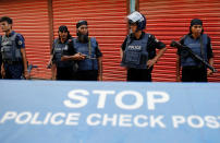 <p>Police keep watch near the site of a gunbattle with militants on the outskirts of Dhaka, Bangladesh, August 27, 2016. (REUTERS/Mohammad Ponir Hossain) </p>