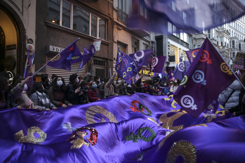 Protesters chant slogans during a rally to mark International Women's Day in Istanbul, Monday, March 8, 2021.Thousands of people joined the march to denounce violence against women in Turkey, where more than 400 women were killed last year. The demonstrators are demanding strong measures to stop attacks on women by former partners or family members as well as government commitment to a European treaty on combatting violence against women. (AP Photo/Emrah Gurel)