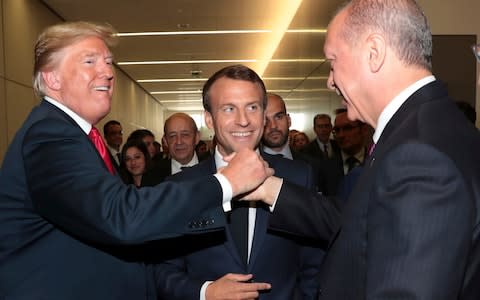 Donald Trump, left, shakes hands with Recep Tayyip Erdogan - Credit: Presidency Press Service via AP, Pool