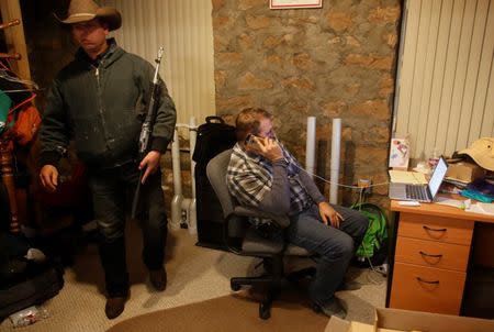 Ryan Bundy (L), and Ammon Bundy are shown in an office at the Malheur National Wildlife Refuge near Burns, Oregon January 6, 2016. REUTERS/Jim Urquhart